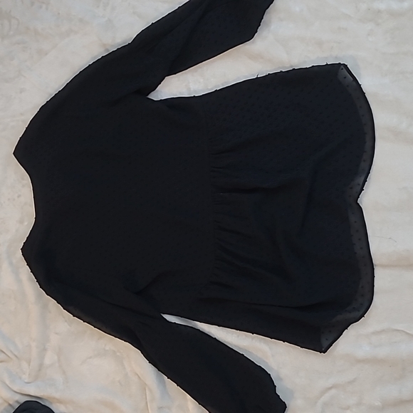 Black Bow Tie Blouse with Polka Sitting and Ruffled Hem - Picture 6 of 6